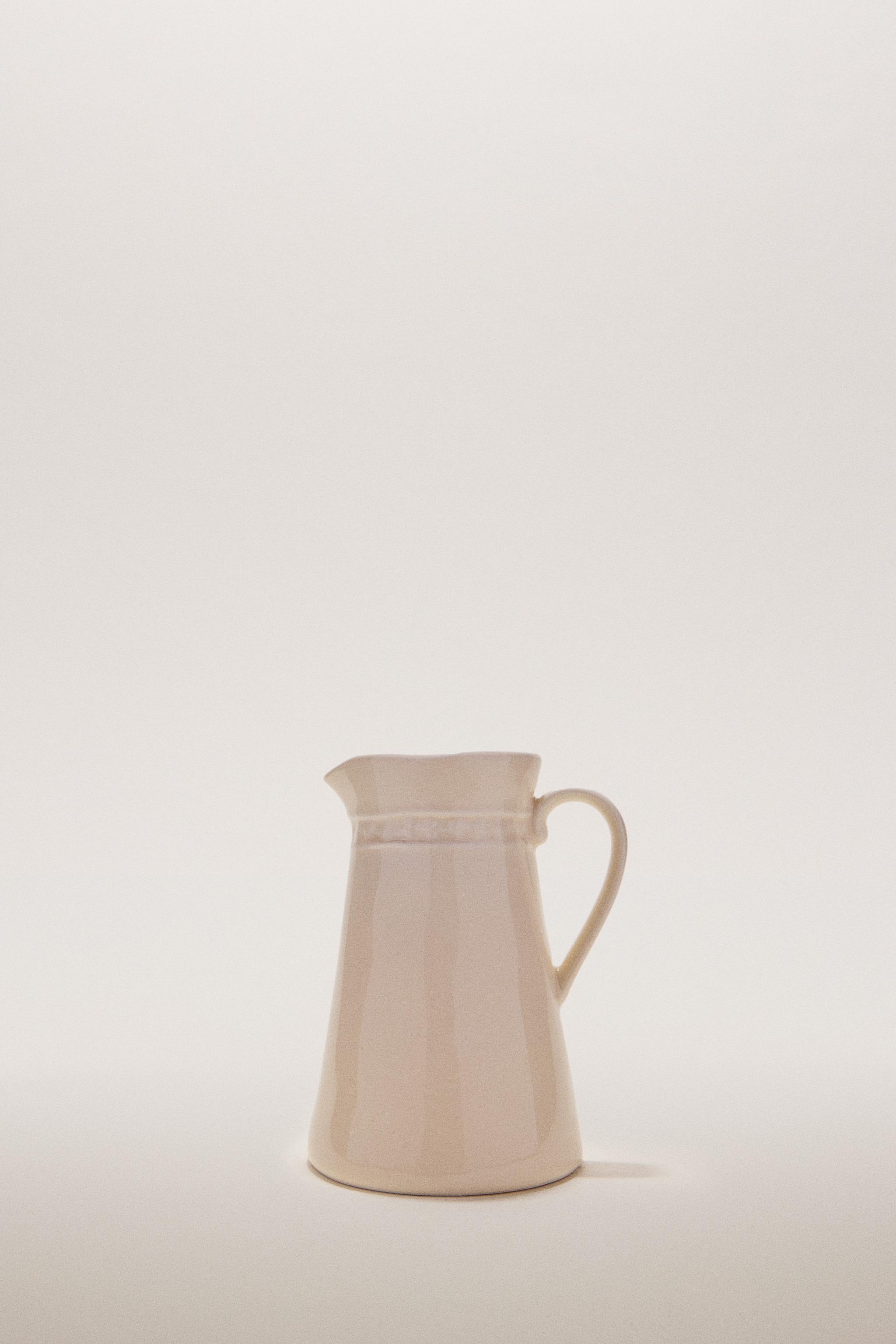 RAISED DESIGN CREAM PITCHER